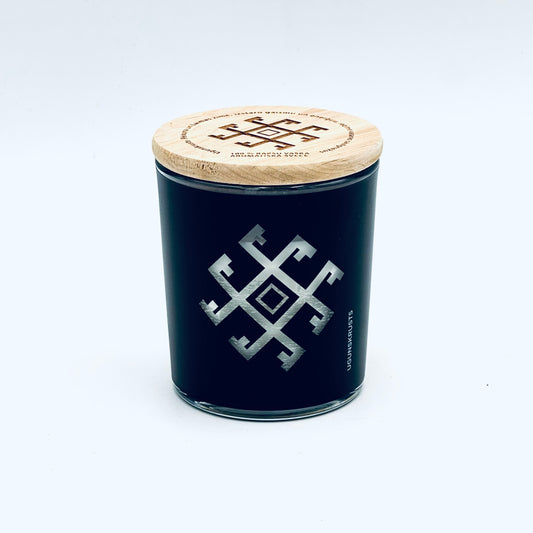 Candle in a glass with Latvian rune "Firecross", scent "Freshly Cut Grass"