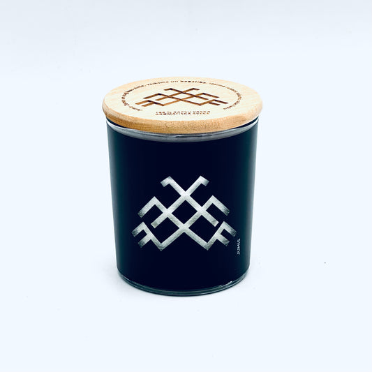 Candle in a glass with Latvian rune "Jumis", scent "Blueberries"