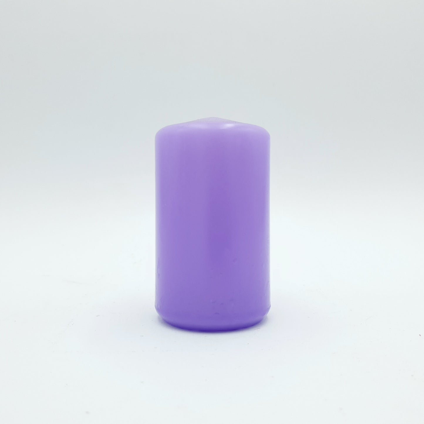 Powderpressed candle ⌀ 6x10 cm, lilac
