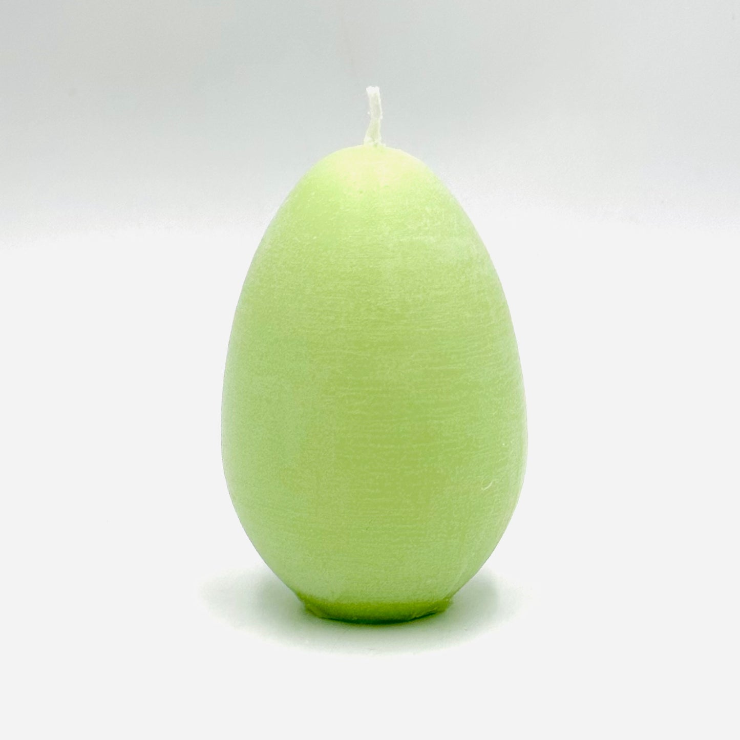 Дизайнерская свеча Пасхальное яйцо из соевого воска, зеленая.