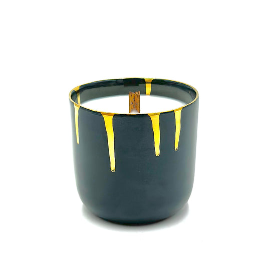 Soy wax candle in a handmade porcelain container with a wooden wick, limited quantity